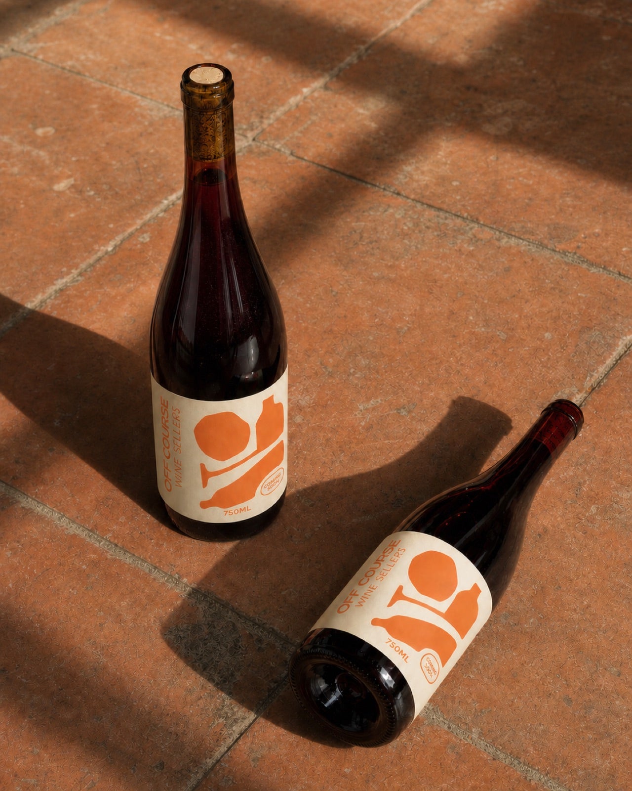 Off Course wine bottle, cream and citrus label, coming soon