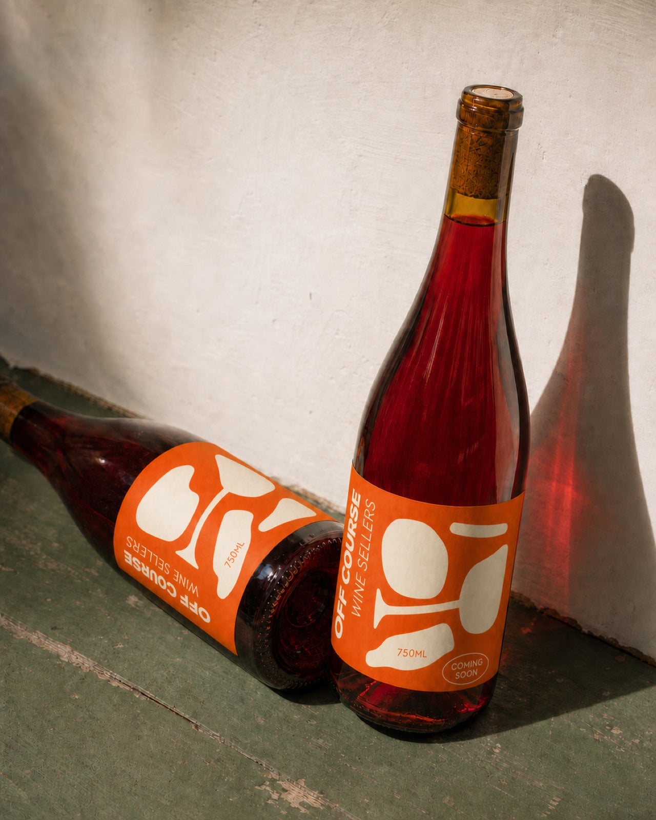 Off Course wine bottle, orange and cream label, coming soon
